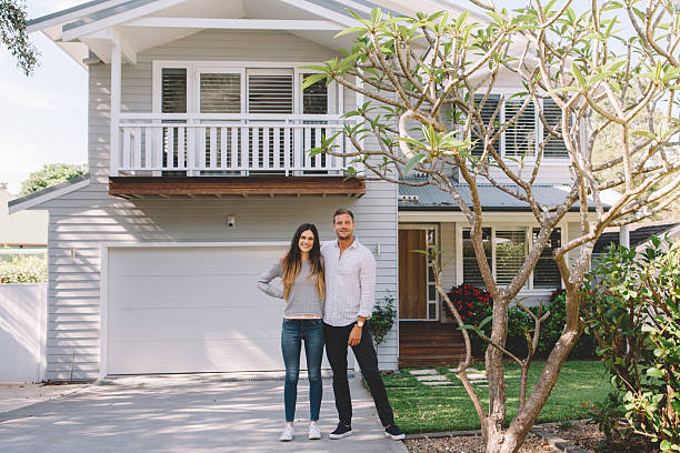 istock happy couple with new home 496848014