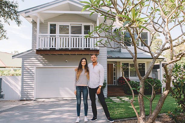 istock happy couple with new home 496848032
