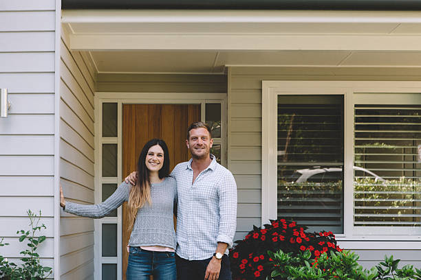 istock happy couple with new home 496848048
