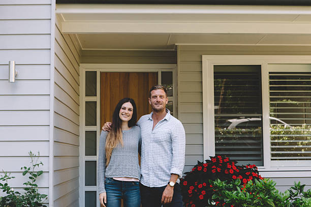 istock happy couple with new home 496848086