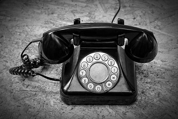 istock Old telephone on wood background. 496851508