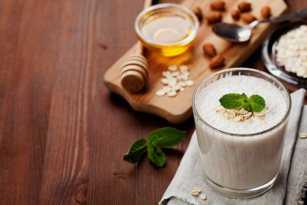 istock Banana smoothie or milkshake with copy space for text 496853586