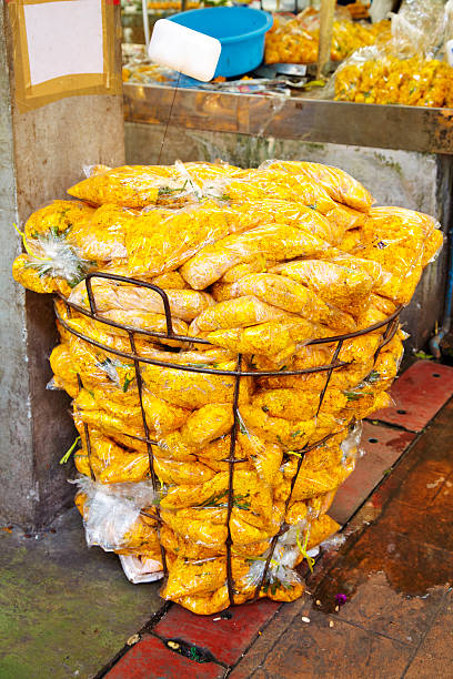 istock many yellow flower in plastic bag 496855147