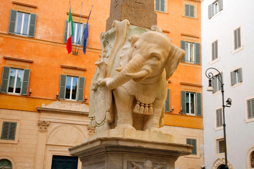 Rome, Italy - February 18, 2012: Piazza della Minerva, elephant statue by Bernini and egyptian obelisk in front of Santa Maria sopra Minerva