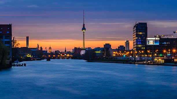 tv tower in berlin, germany, at night tv tower in berlin, germany, at night view from oberbaum bridge friedrichshain photos stock pictures, royalty-free photos & images
