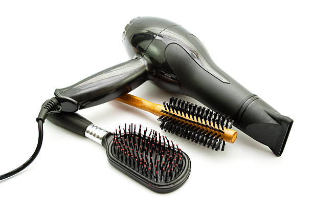 istock Black Hairdryer with Different Hairbrush 496855567