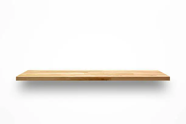 Photo of Blank wooden wall shelf on white background