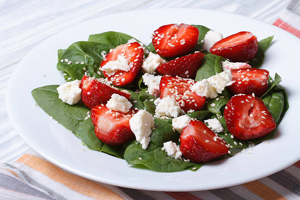 istock Fresh strawberry salad with spinach and cheese 496856327