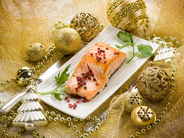 istock grilled salmon with pink pepper on christmas table 496858064