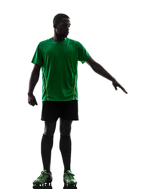 istock african man soccer player silhouette 496858433