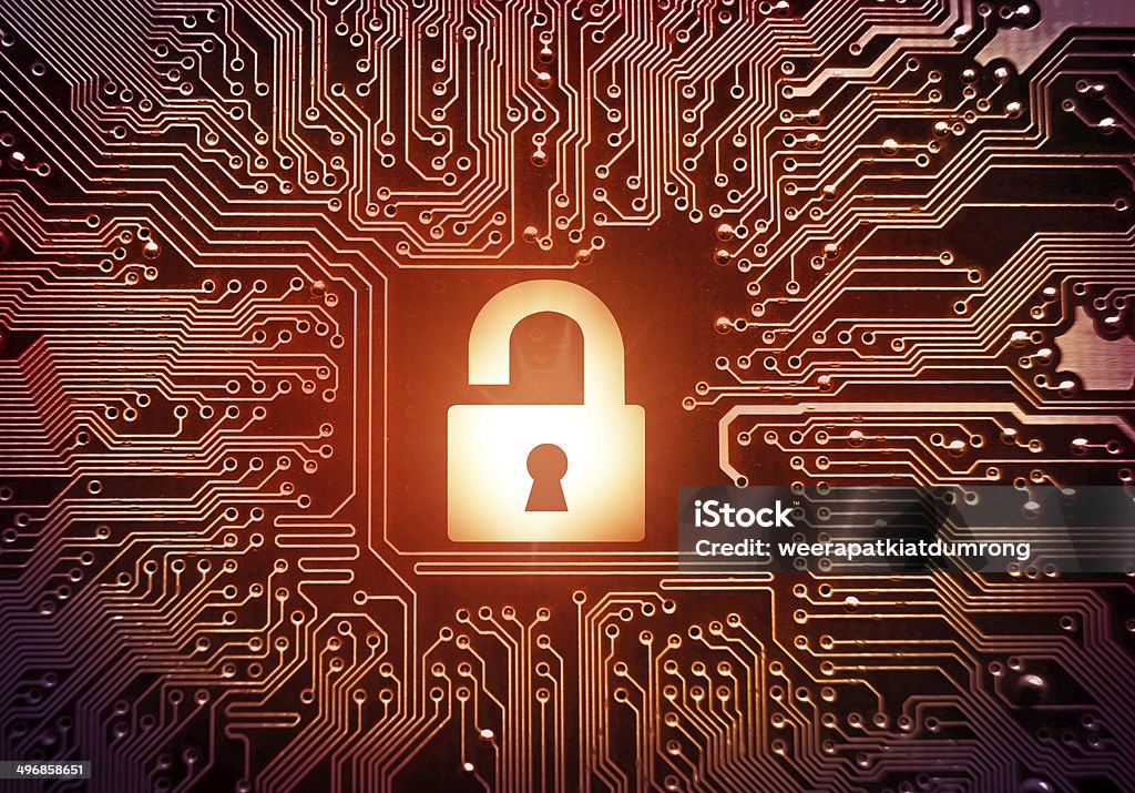 hacking computer system Hacked symbol on computer circuit board with open red padlock Internet Stock Photo