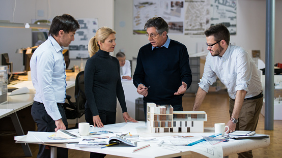 Architects and Custumer in Office.