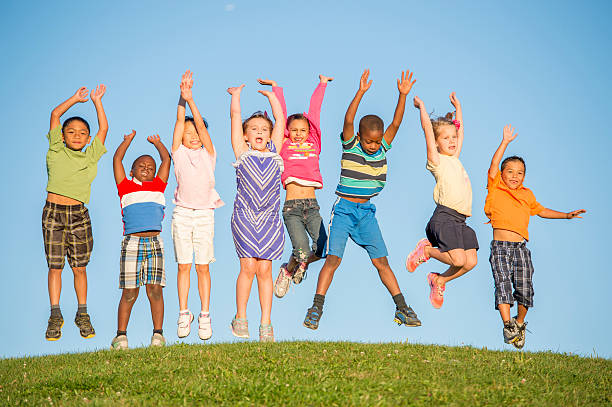 istock Jumping up in the Air on a Hill Top 496860940
