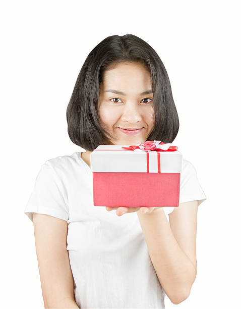 istock Young Asian women with no makeup holding gift box. 496861970
