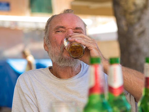 istock Man, drinking beer in Komiza restaurant, Croatia 496862714