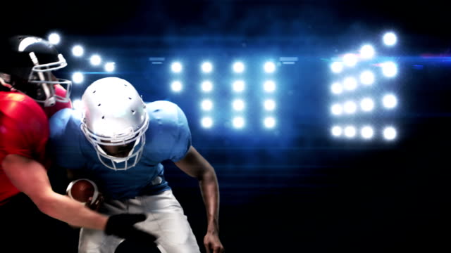 American football players against flashing lights