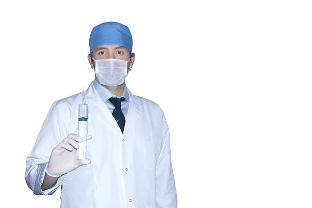 médico com máscara e isolado de injecção - one person looking at camera male posing imagens e fotografias de stock