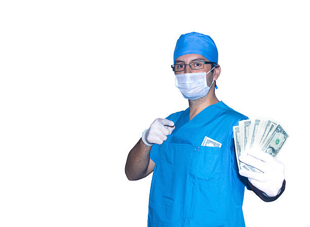 cirurgião com dólares - one person looking at camera male posing imagens e fotografias de stock