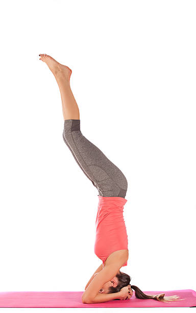 istock young beautiful girl yoga posing 496875743