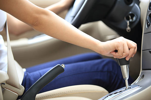 istock woman driver shifting the gear stick 496876665