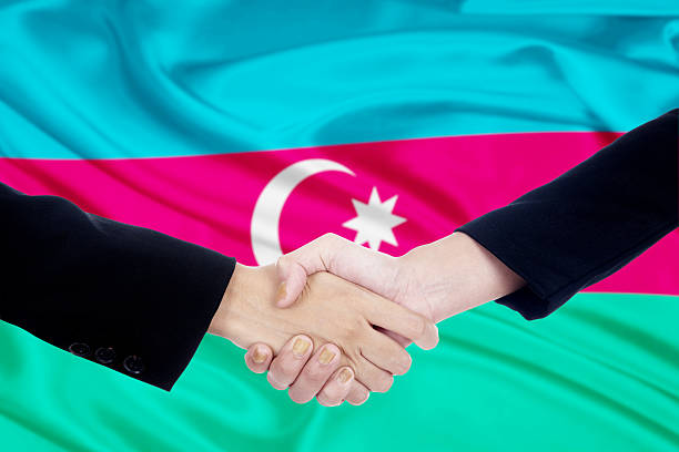 istock Handshake with flag of azerbaijan 496877066