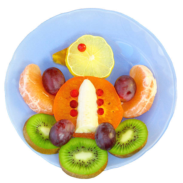 istock Bird of fruit on a blue plate on a white background 496877202