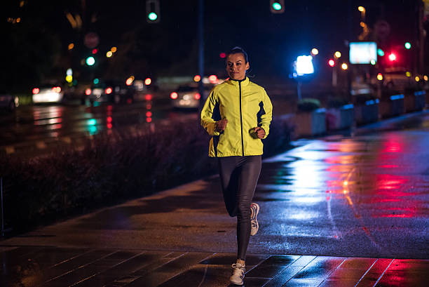 istock Woman jogging in city 496877698