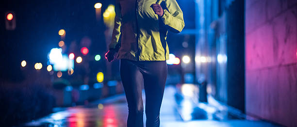 istock Woman jogging in city 496877866