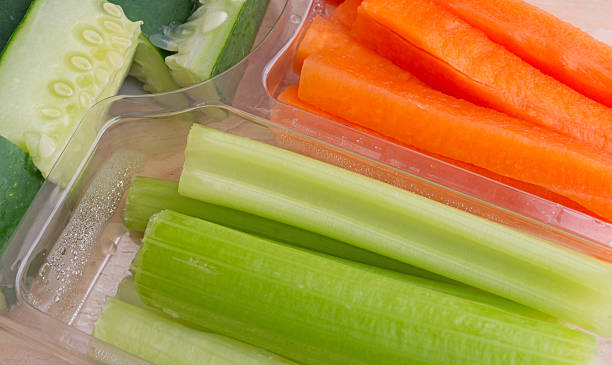 istock Carrots celery and cucumbers in plastic tray 496877870