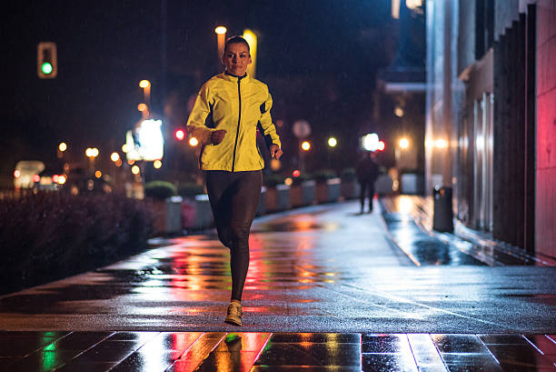 istock Woman jogging in city 496877970