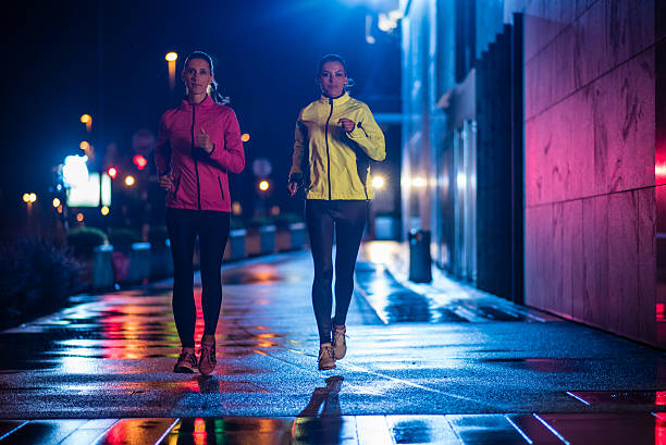 istock Women jogging in city 496878050