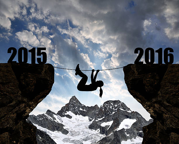 istock Girl climbs into the New Year 2016 496878578