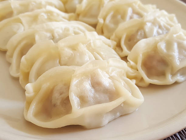 istock Close up fresh boiled gyoza dumplings 496878784