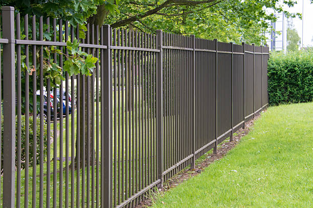 Metal fence Metal industrial security fencing wrought iron stock pictures, royalty-free photos & images