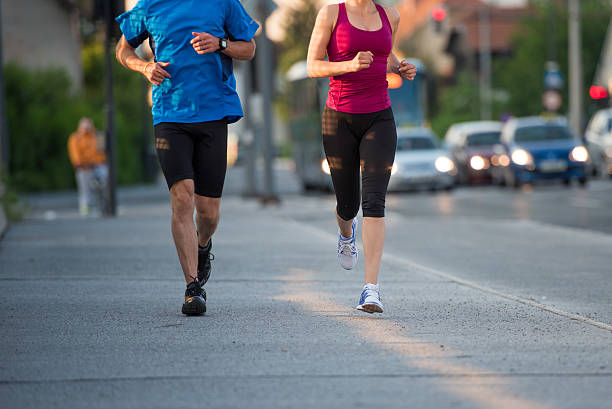 istock Man and woman jogging 496879148