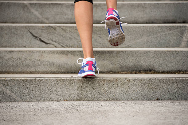 istock Woman jogging in city 496879940