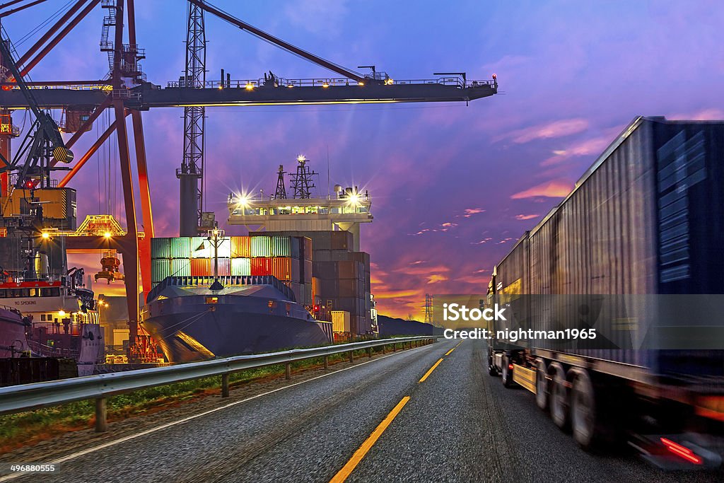 Truck in port Truck transport container on the road to the port. Freight Transportation Stock Photo
