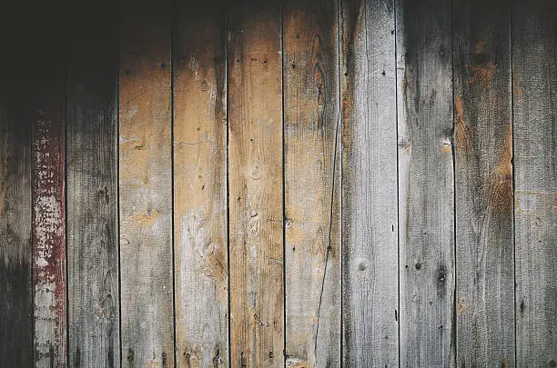 Old wooden gray beige plank texture background wall, full frame