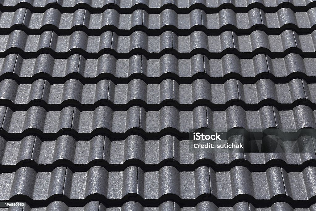 black tiles roof black tiles roof on a new house Abstract Stock Photo