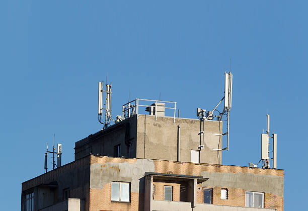 Building top with antennas stock photo