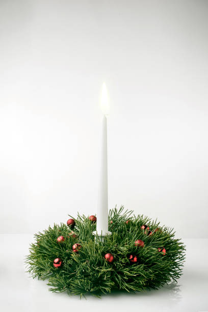 istock Christmas wreath and candle 496884292