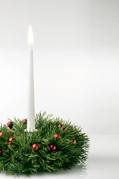 istock Christmas wreath and candle 496884352