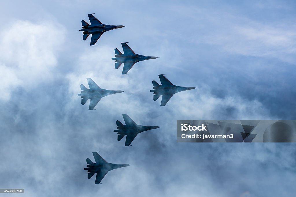 Silhouettes of russian fighter aircrafts SU-27 in the sky Aerospace Industry Stock Photo