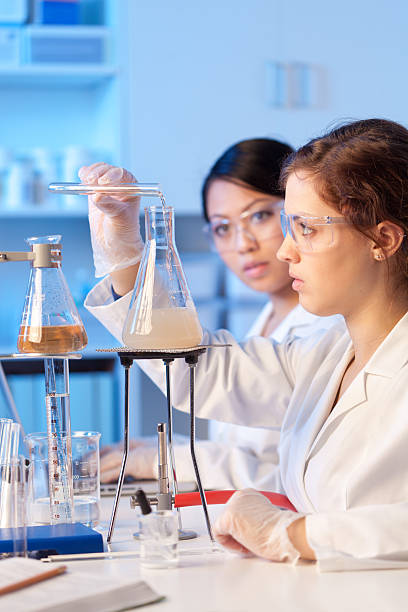 istock Two Women Science Students Working Together in Chemistry Education Laboratory 496887132