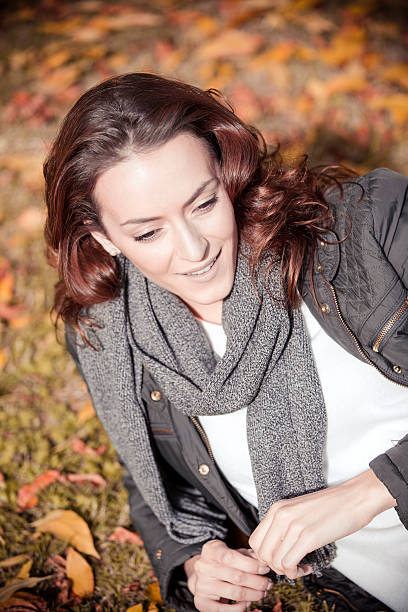 istock Woman out walking in the autumn sun 496888614