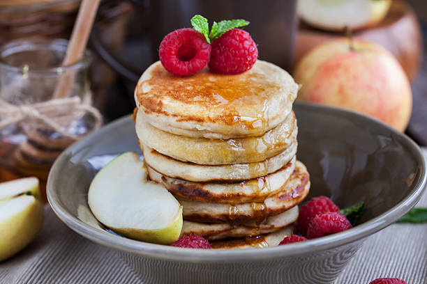 istock Apple pancakes with honey for breakfast 496888852