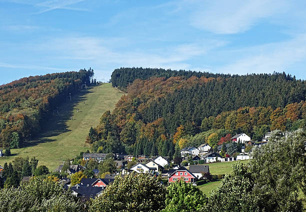 Ski slopes in Willingen in the Sauerland region in autumn Ski slopes in Willingen in the Sauerland region in autumn winterberg stock pictures, royalty-free photos & images