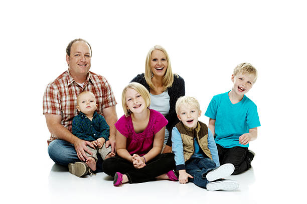 istock Happy family sitting on floor 496916365