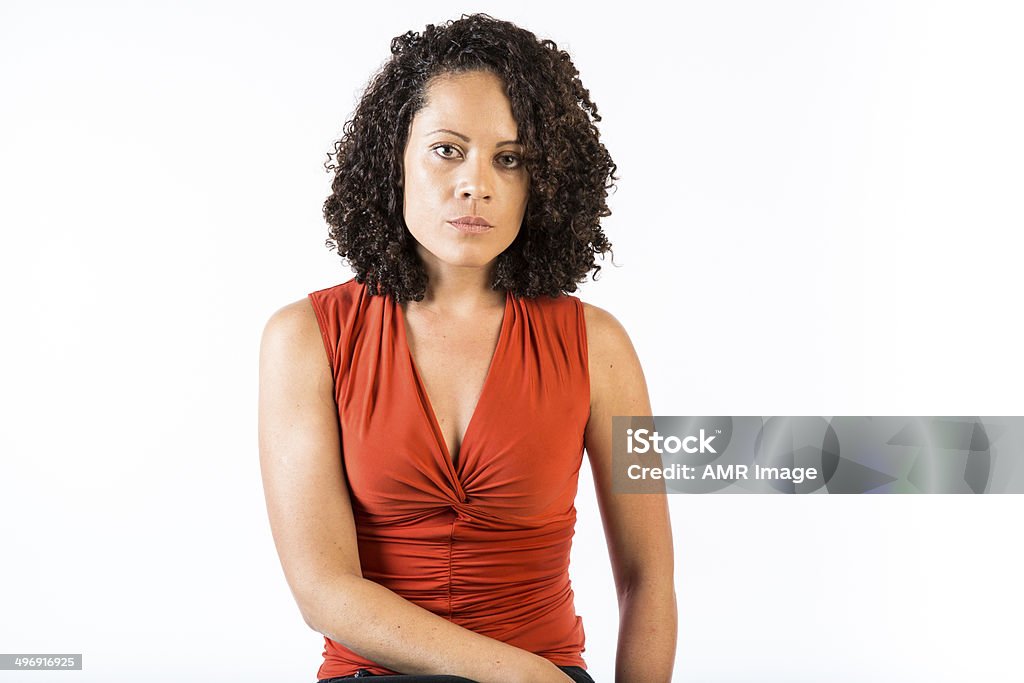 Serious woman of mixed race Beautiful woman of mixed race in her 30s looking serous. One Woman Only Stock Photo