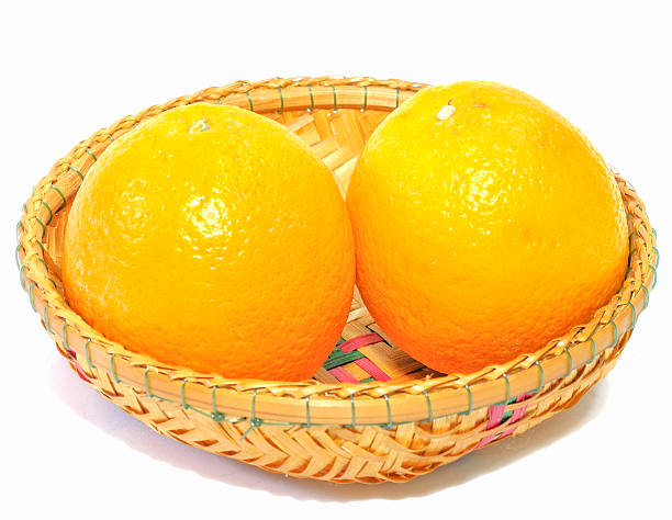 istock Oranges isolated in woven basket 496917539